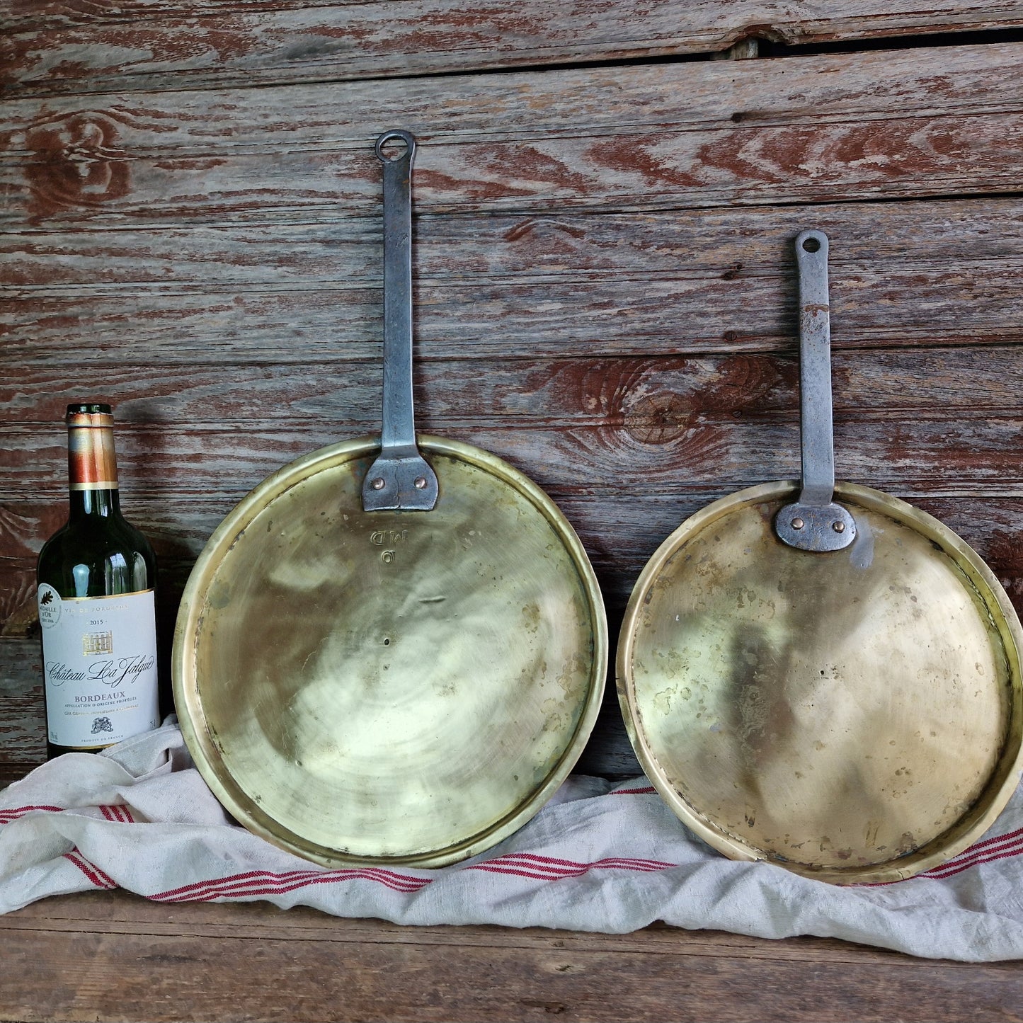 French antique brass pan lids. French kitchen decor.