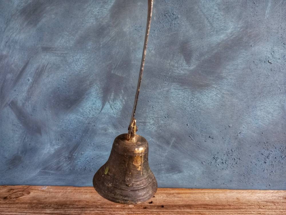 French antique shop bell. Old shop bell.