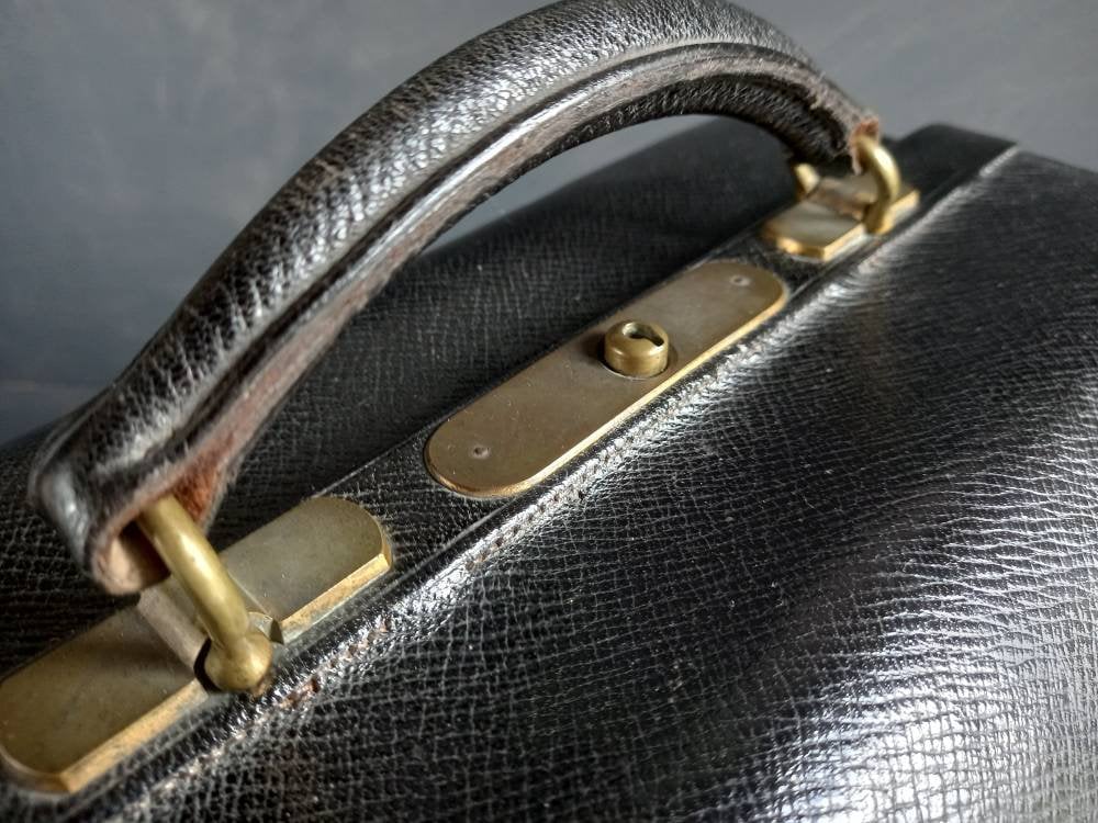 Mappin and Webb black leather antique vanity case. Mappin and Webb luggage.