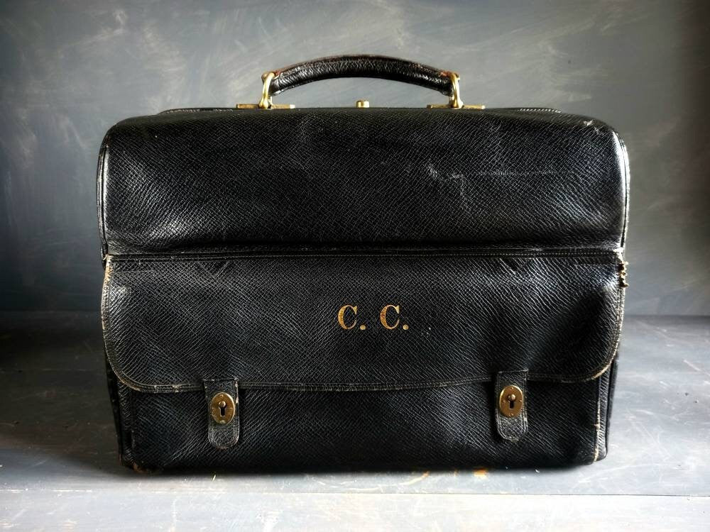 Mappin and Webb black leather antique vanity case. Mappin and Webb luggage.