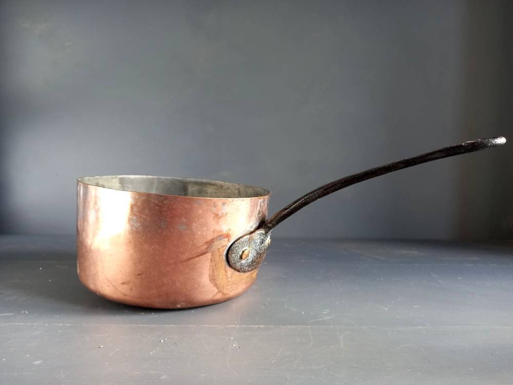 Antique copper pan. Copper pot. Copper saucepan.