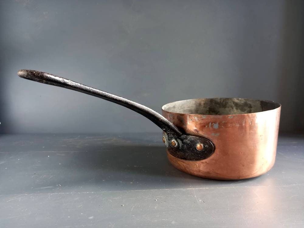 Antique copper pan. Copper pot. Copper saucepan.