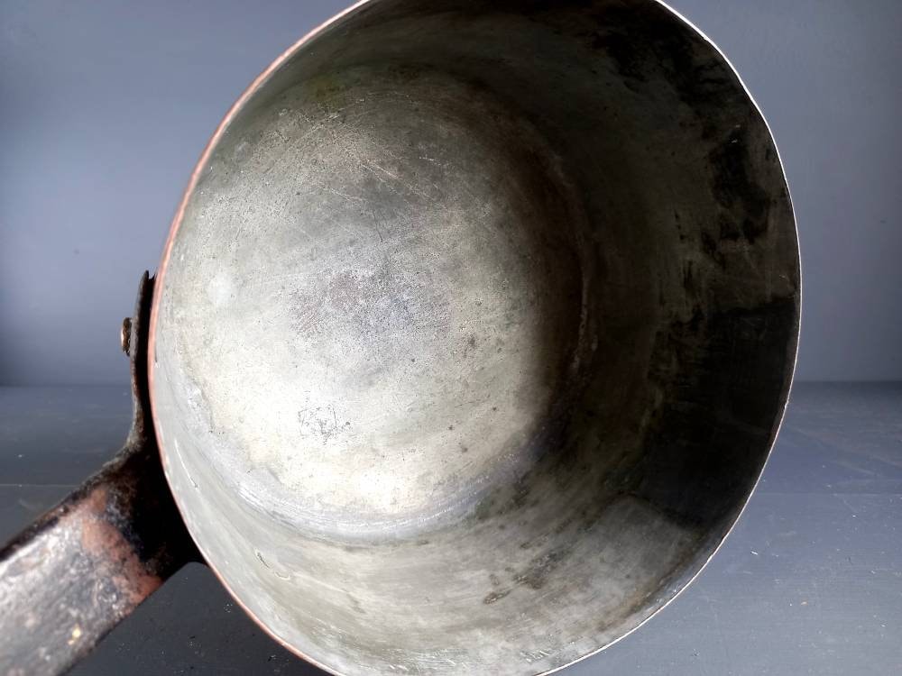Antique copper pan. Copper pot. Copper saucepan.