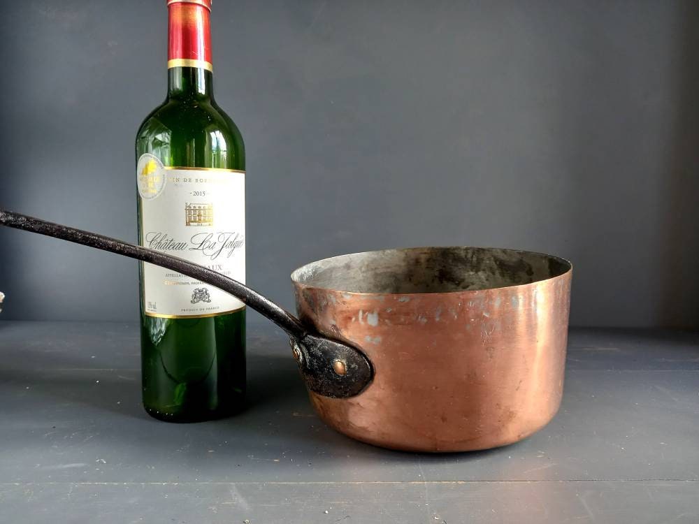 Antique copper pan. Copper pot. Copper saucepan.