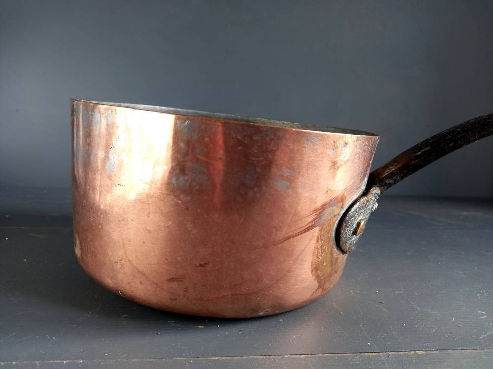 Antique copper pan. Copper pot. Copper saucepan.