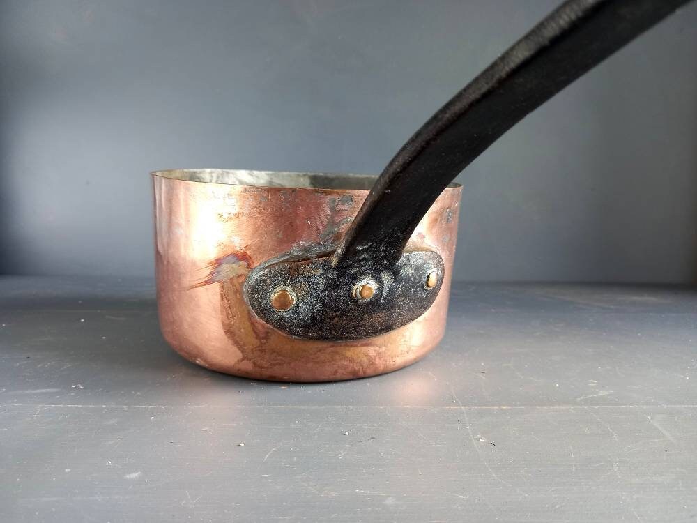 Antique copper pan. Copper pot. Copper saucepan.