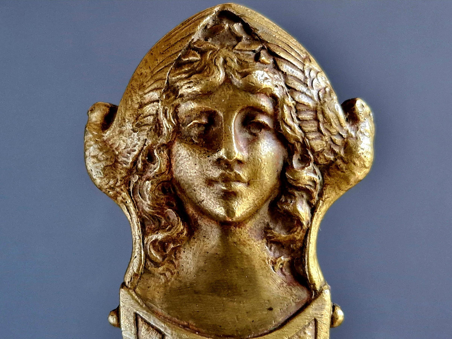 French bronze Art Nouveau paper knife with ladies head decoration.