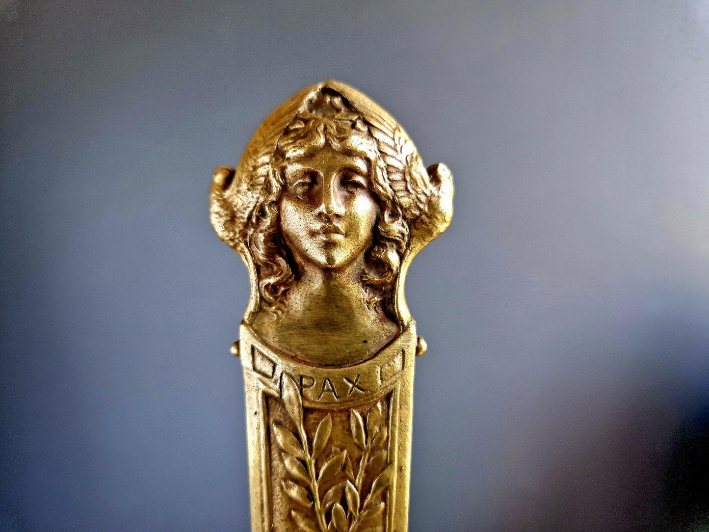 French bronze Art Nouveau paper knife with ladies head decoration.