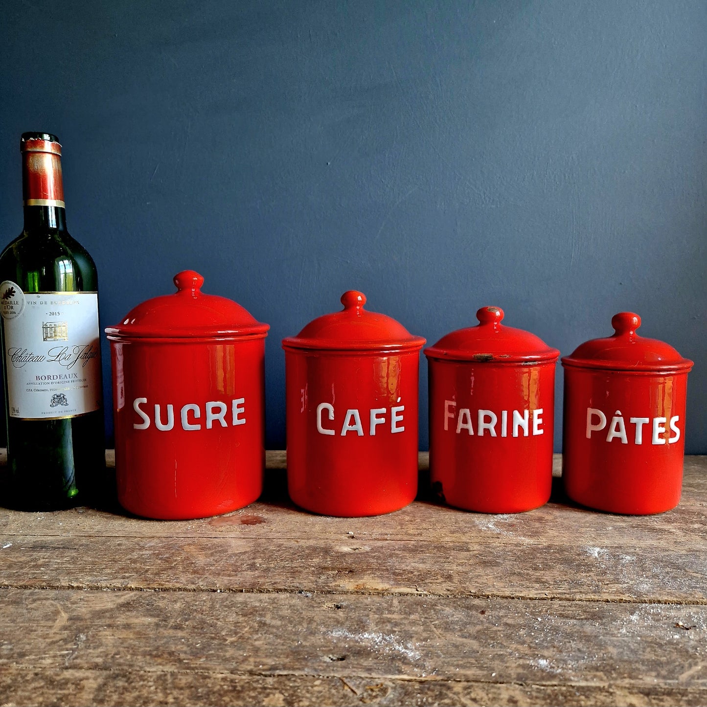 Vintage red enamel French kitchen canisters