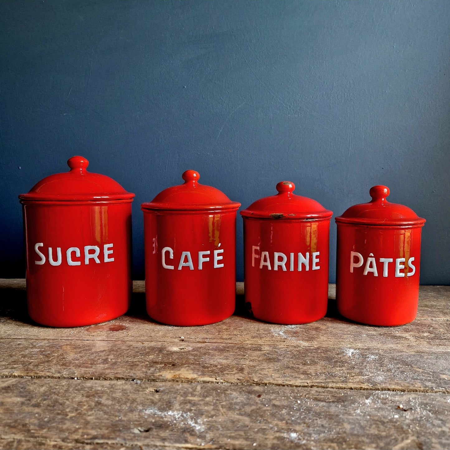 Vintage red enamel French kitchen canisters