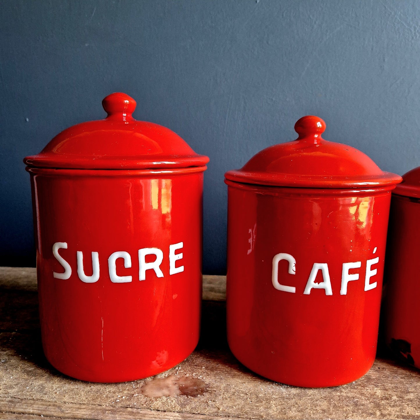 Vintage red enamel French kitchen canisters