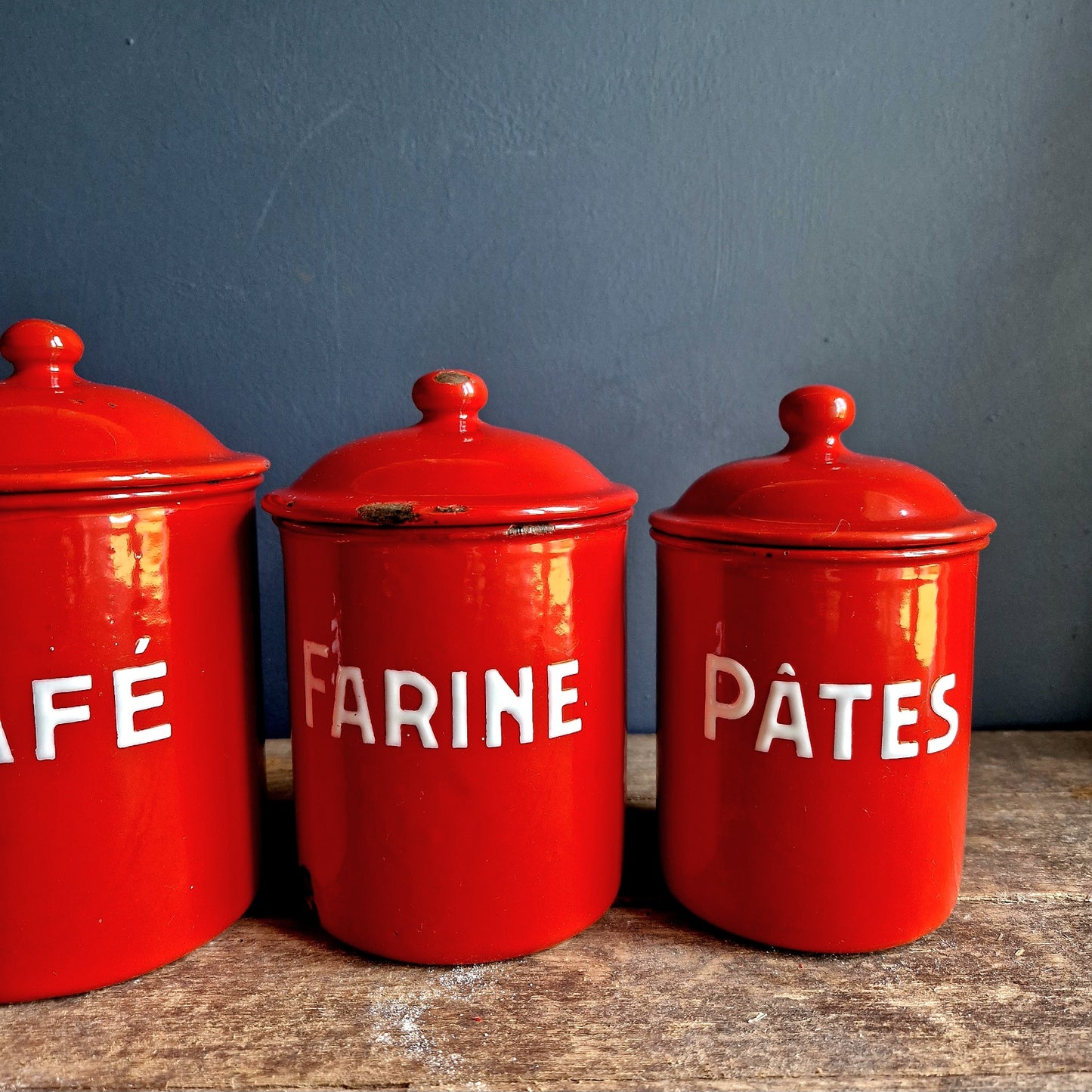 Vintage red enamel French kitchen canisters