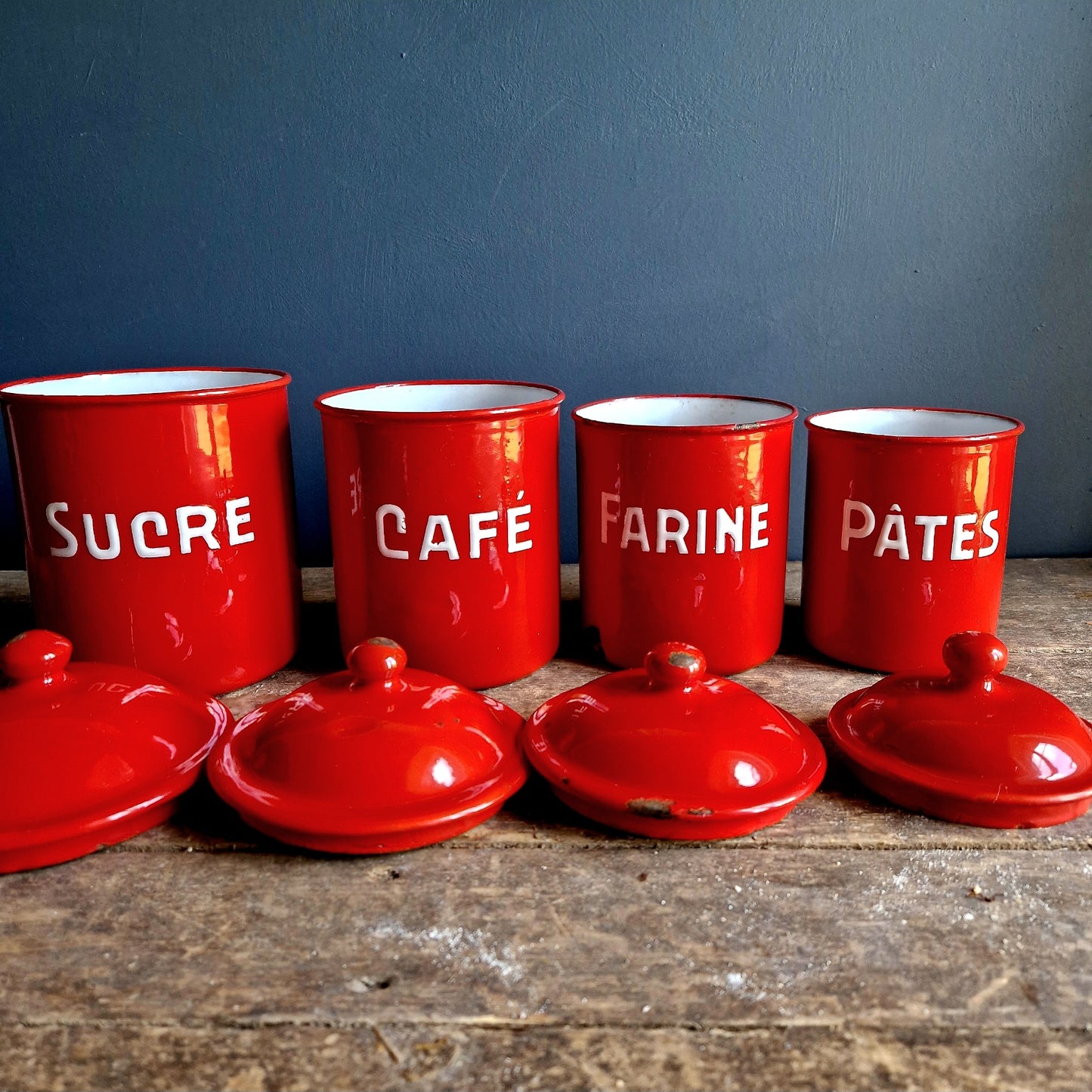 Vintage red enamel French kitchen canisters