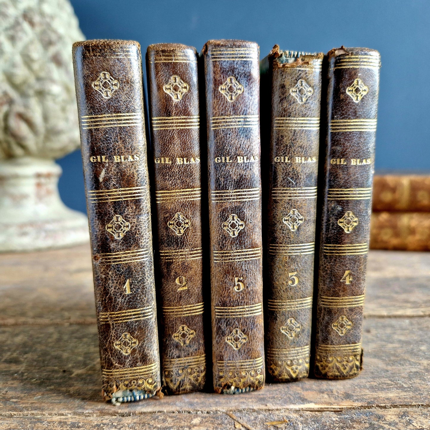 Set of five leather bound French antique books.