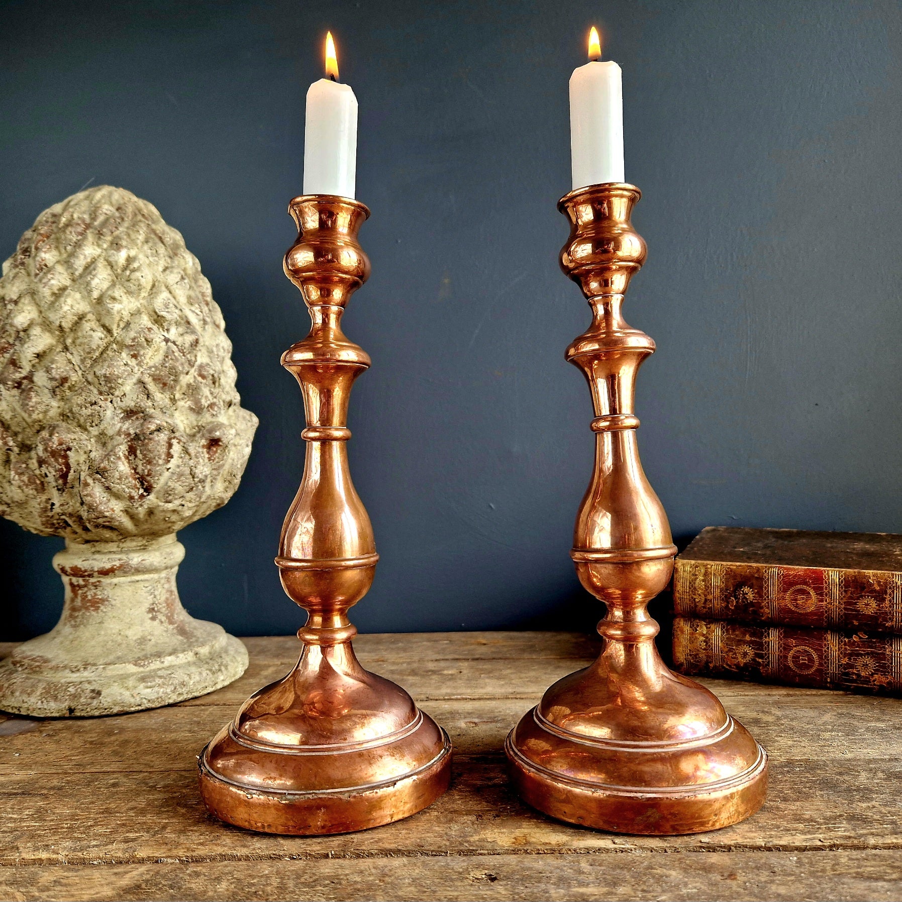 Pair of French antique copper candle holders.