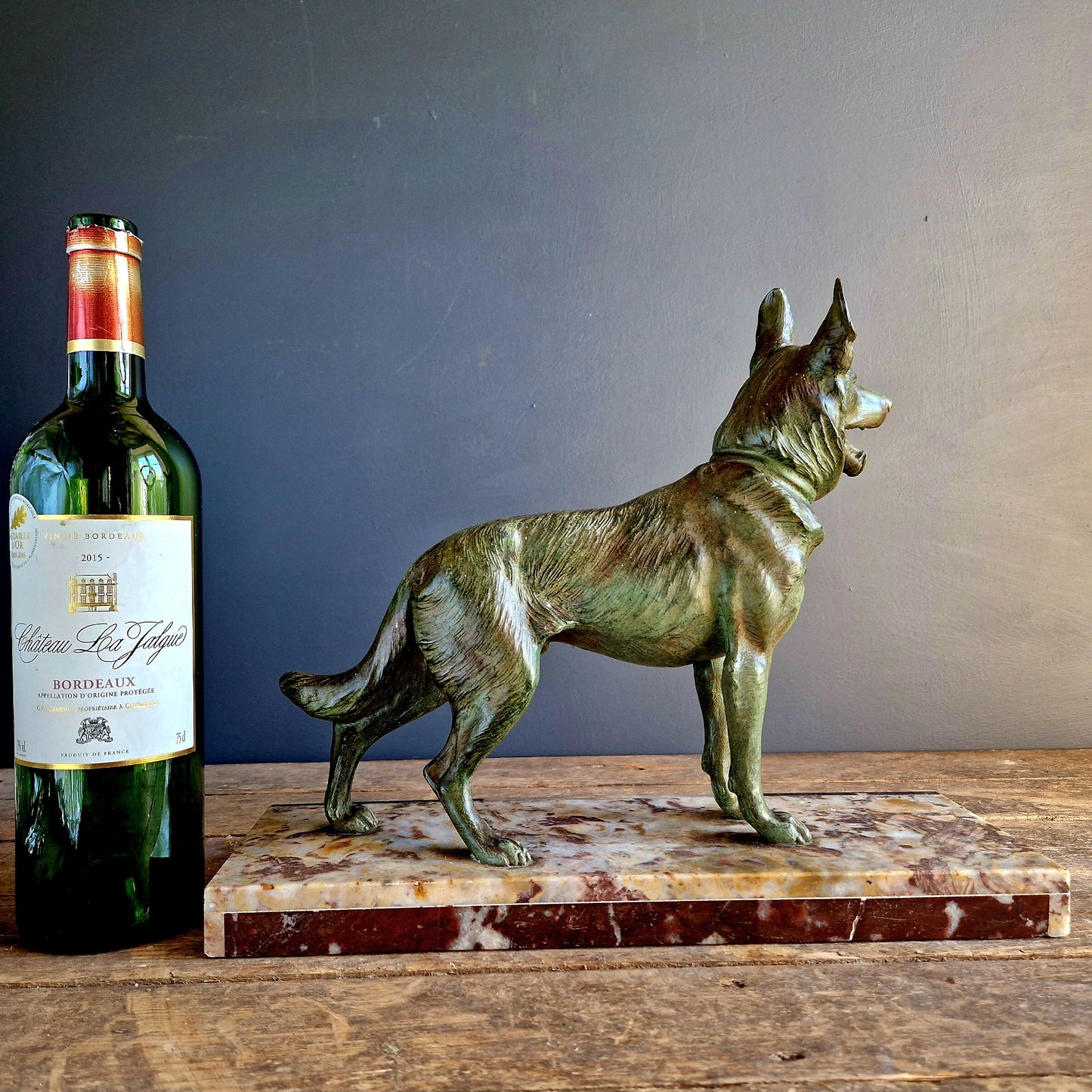 French antique dog sculpture. German shepherd dog statue.