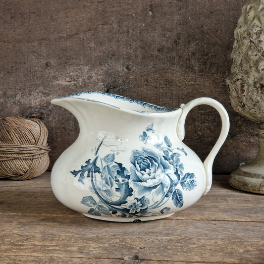 French antique transferware jug with floral decoration.