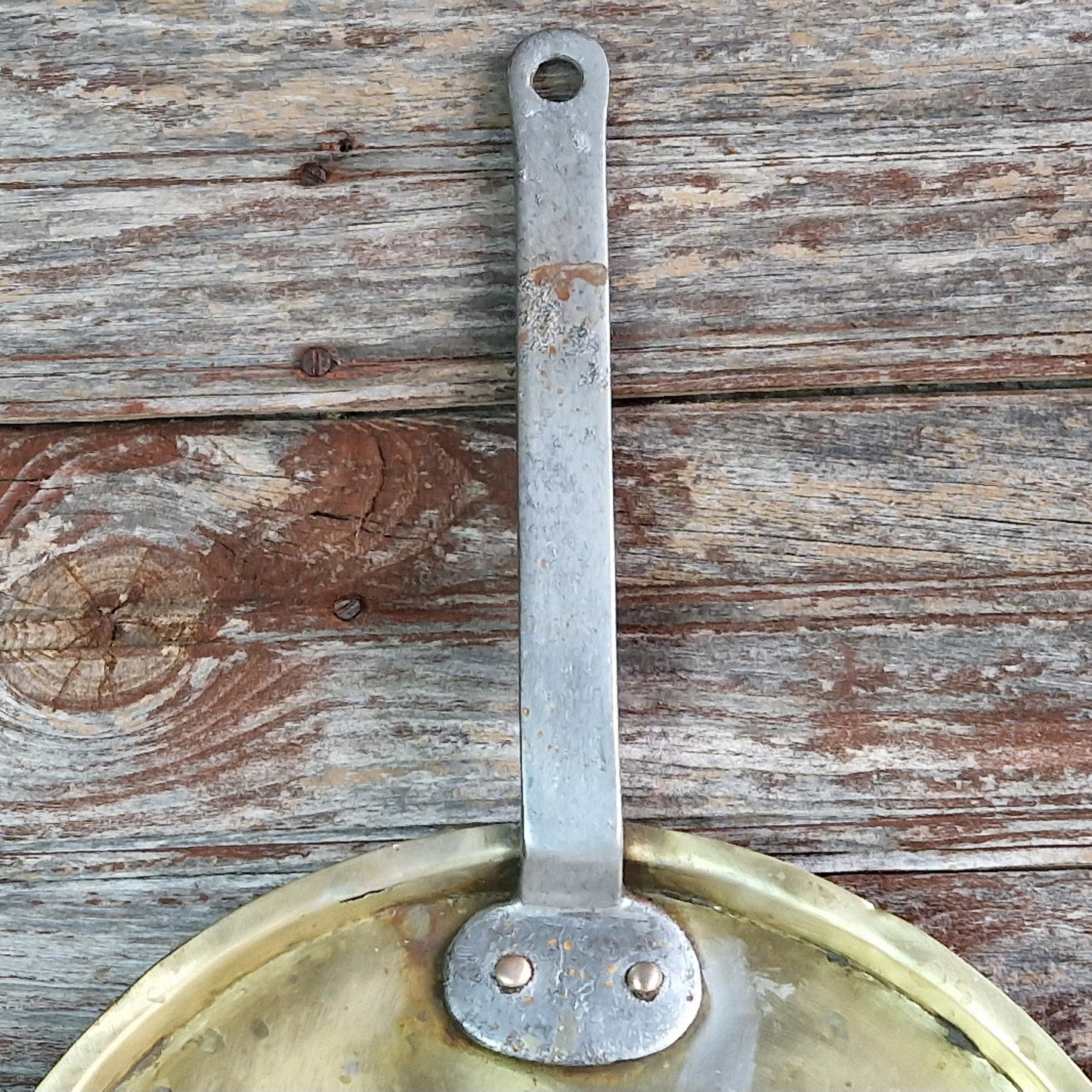 French antique brass pan lids. French kitchen decor.