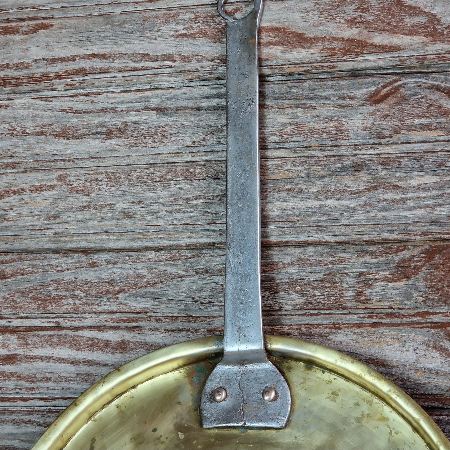 French antique brass pan lids. French kitchen decor.