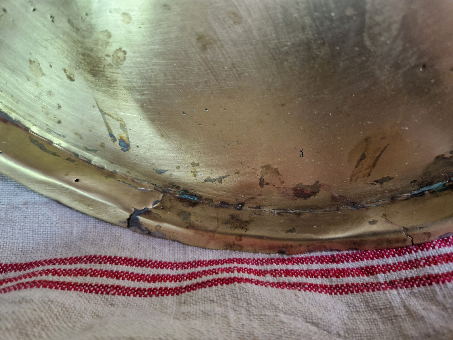 French antique brass pan lids. French kitchen decor.
