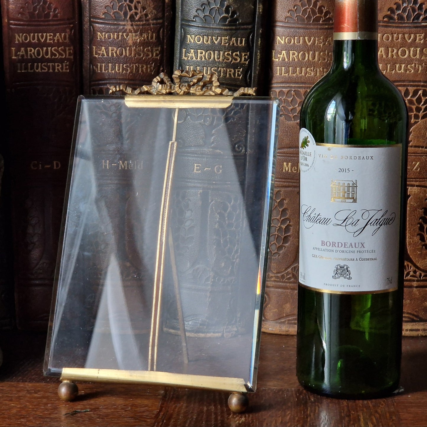 French antique glass frame with ribbon decoration top.