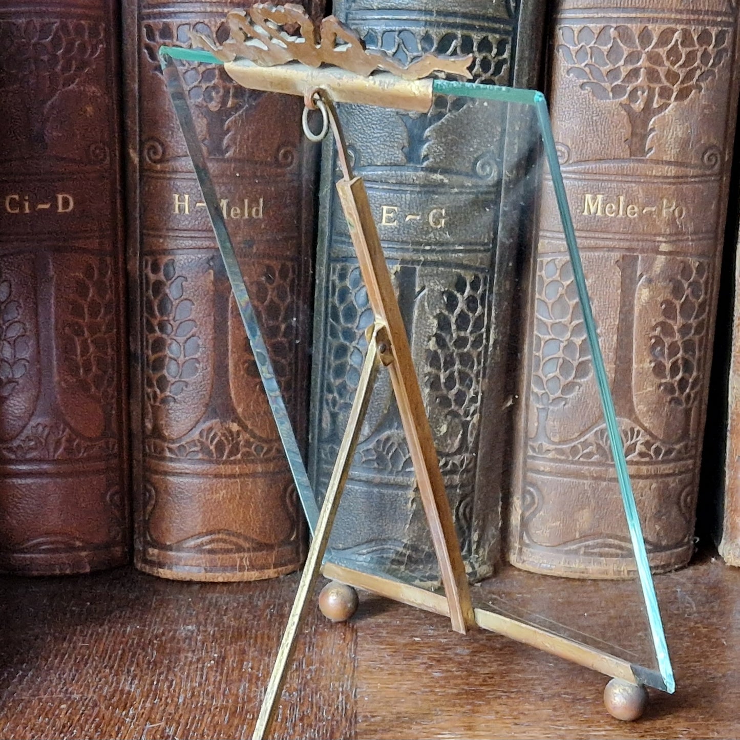 French antique glass frame with ribbon decoration top.