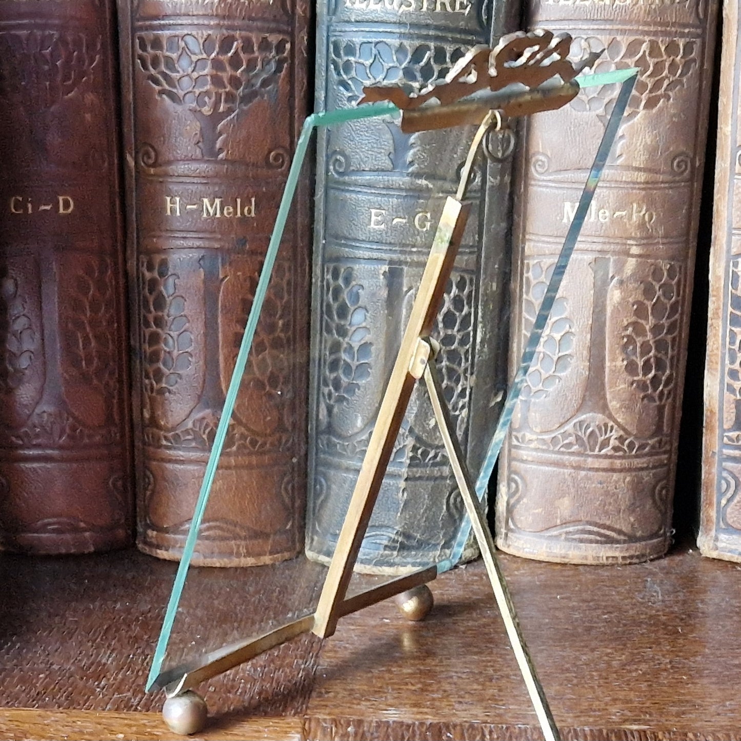 French antique glass frame with ribbon decoration top.