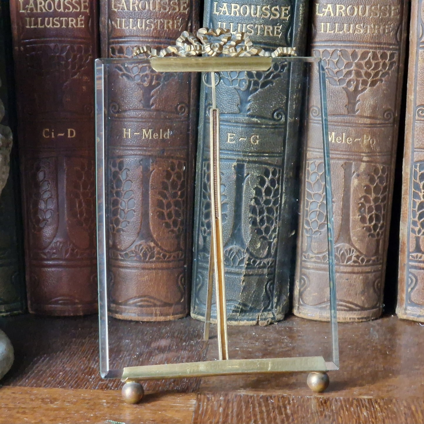 French antique glass frame with ribbon decoration top.