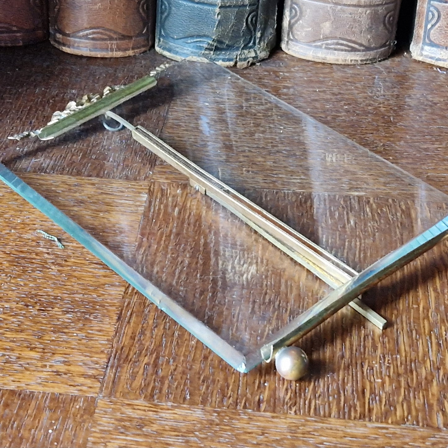 French antique glass frame with ribbon decoration top.