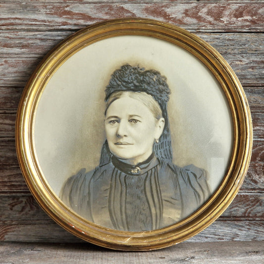 Gilt wood round framed Victorian photo.