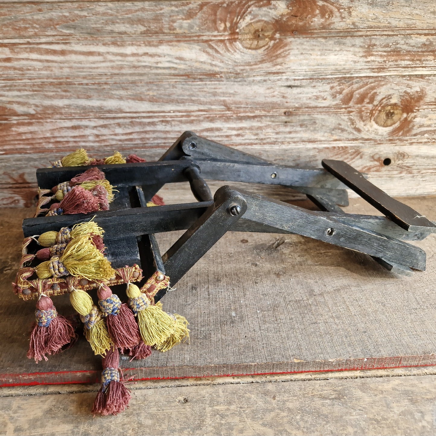 French antique small folding gypsy table with tassel decoration.