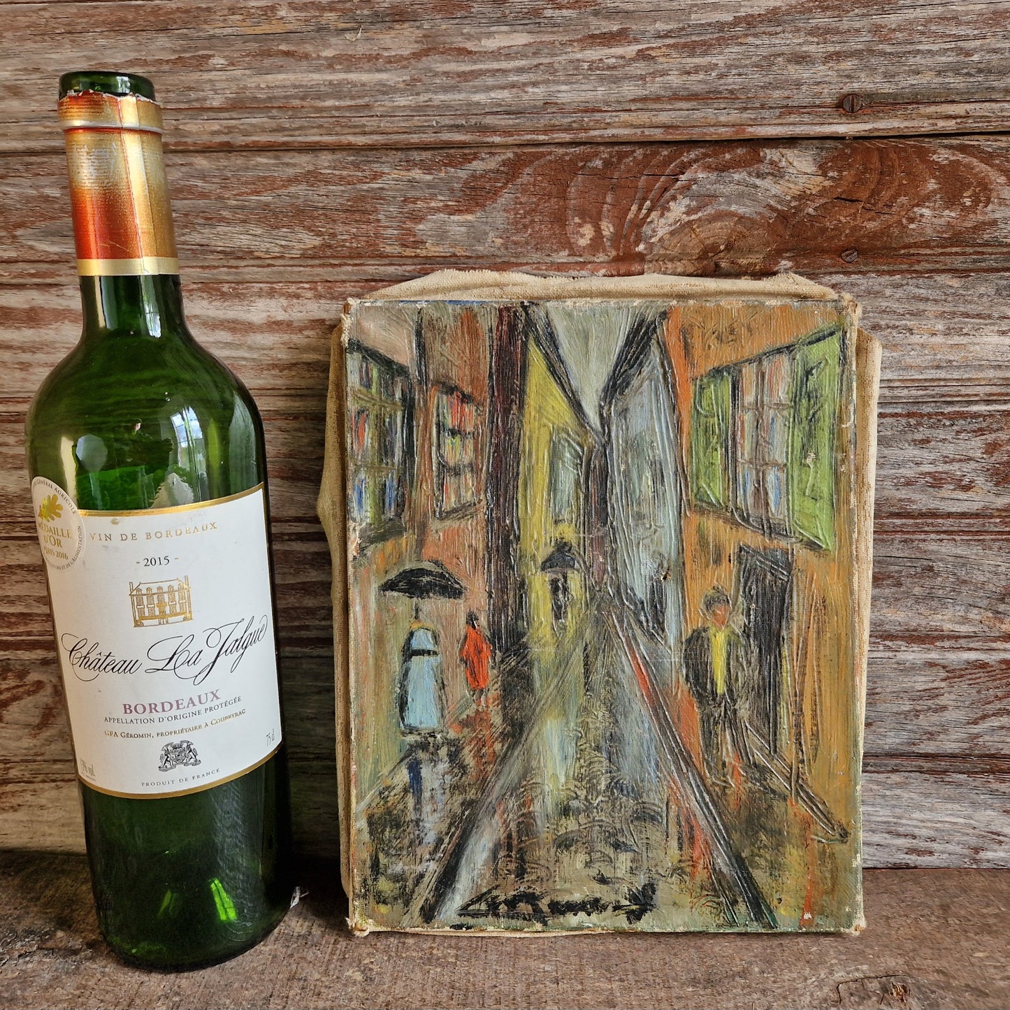 Small French mid century oil painting of a street scene. Original French art.