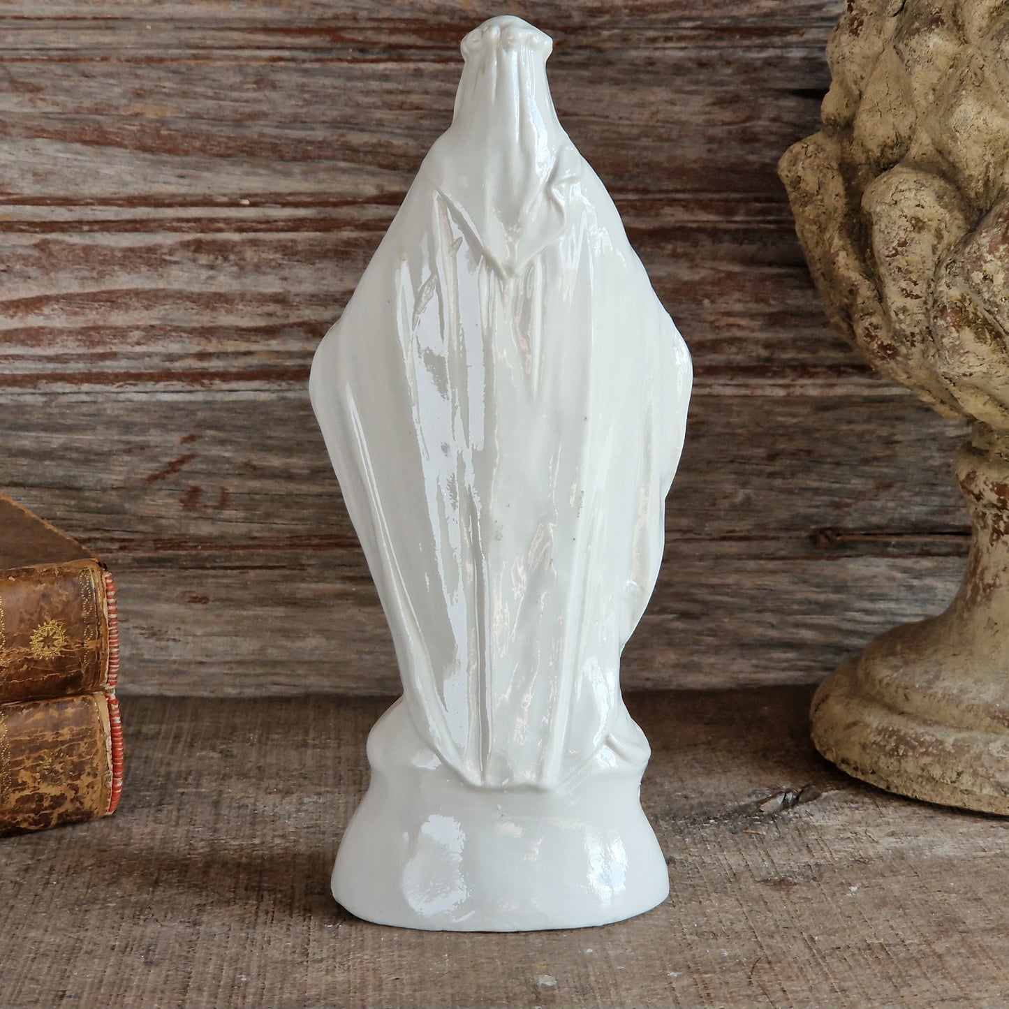 French porcelain Madonna statue with gilt decoration.