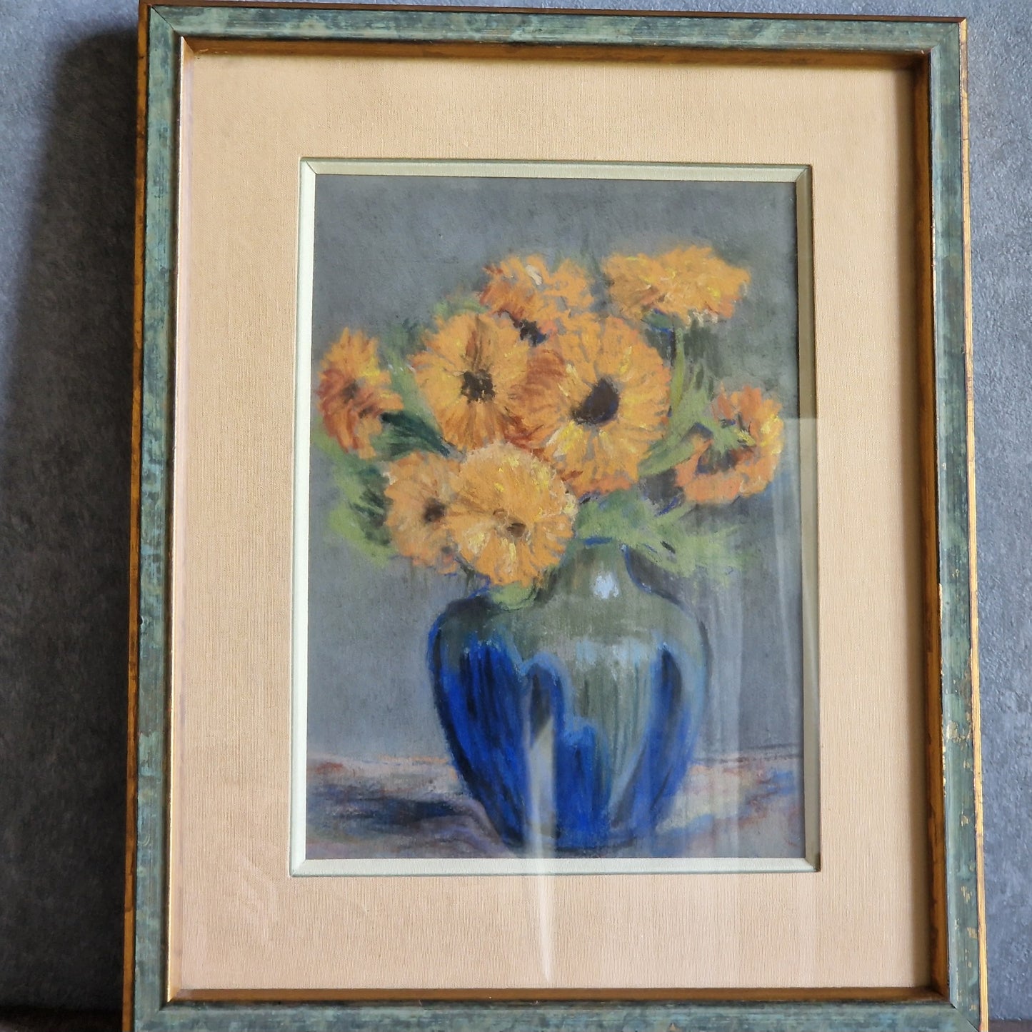 French pastel picture of sunflowers in a blue vase.