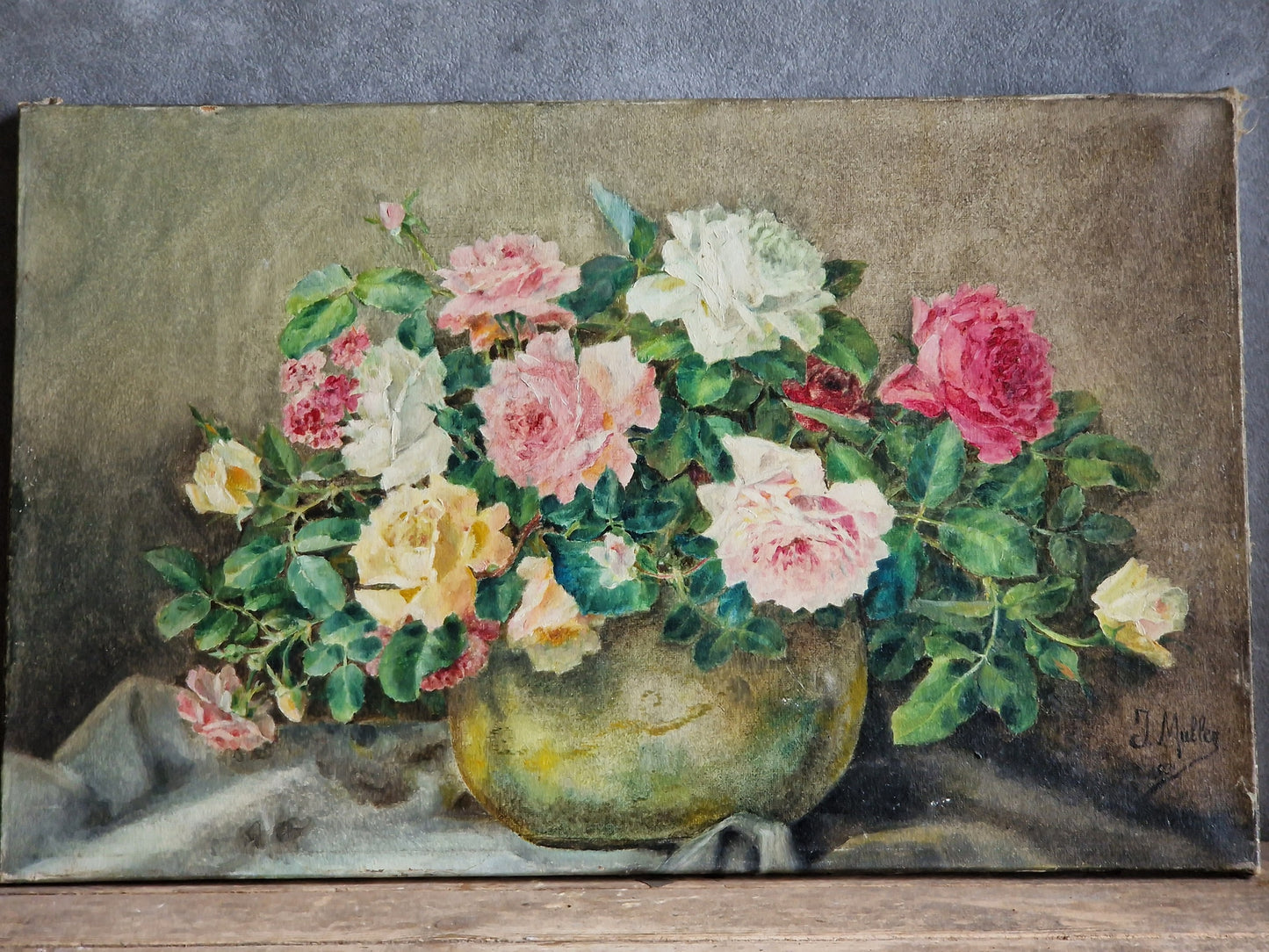 Vintage painting of a floral arrangement in a vase on a textured surface.