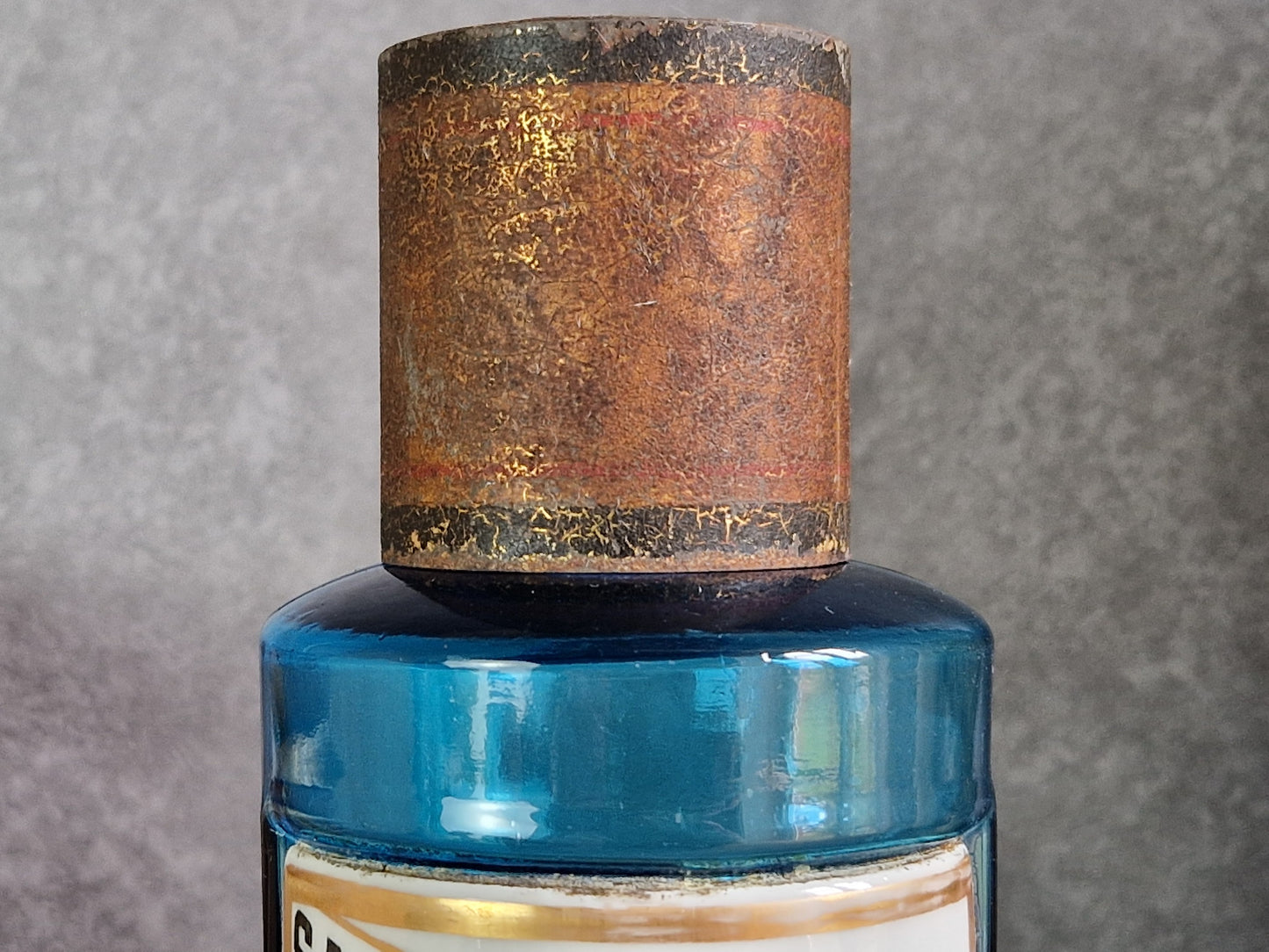 French antique blue apothecary bottle with toleware lid.