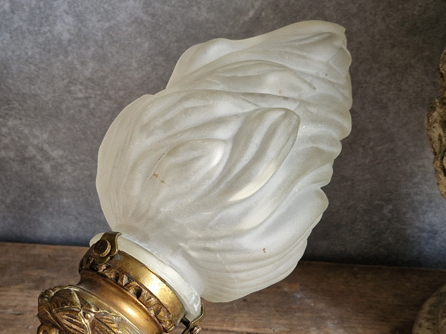French antique gilt bronze wall sconce with torchere glass shade. Antique French wall light with 18th century decoration.