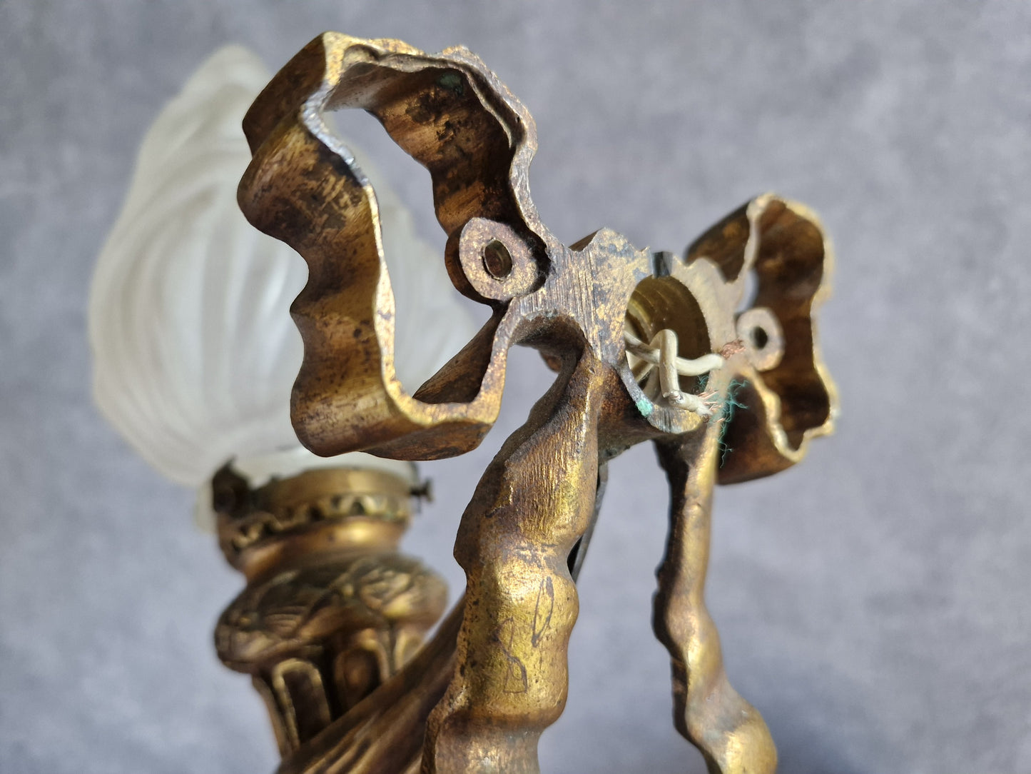 French antique gilt bronze wall sconce with torchere glass shade. Antique French wall light with 18th century decoration.