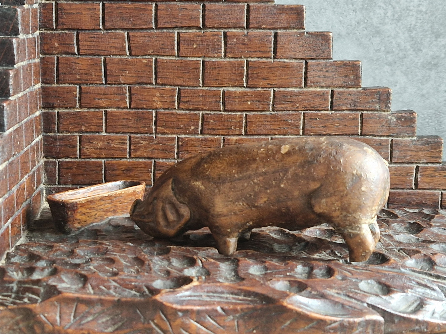French wooden folk art pig diorama. Hand carved wooden pig in sty.