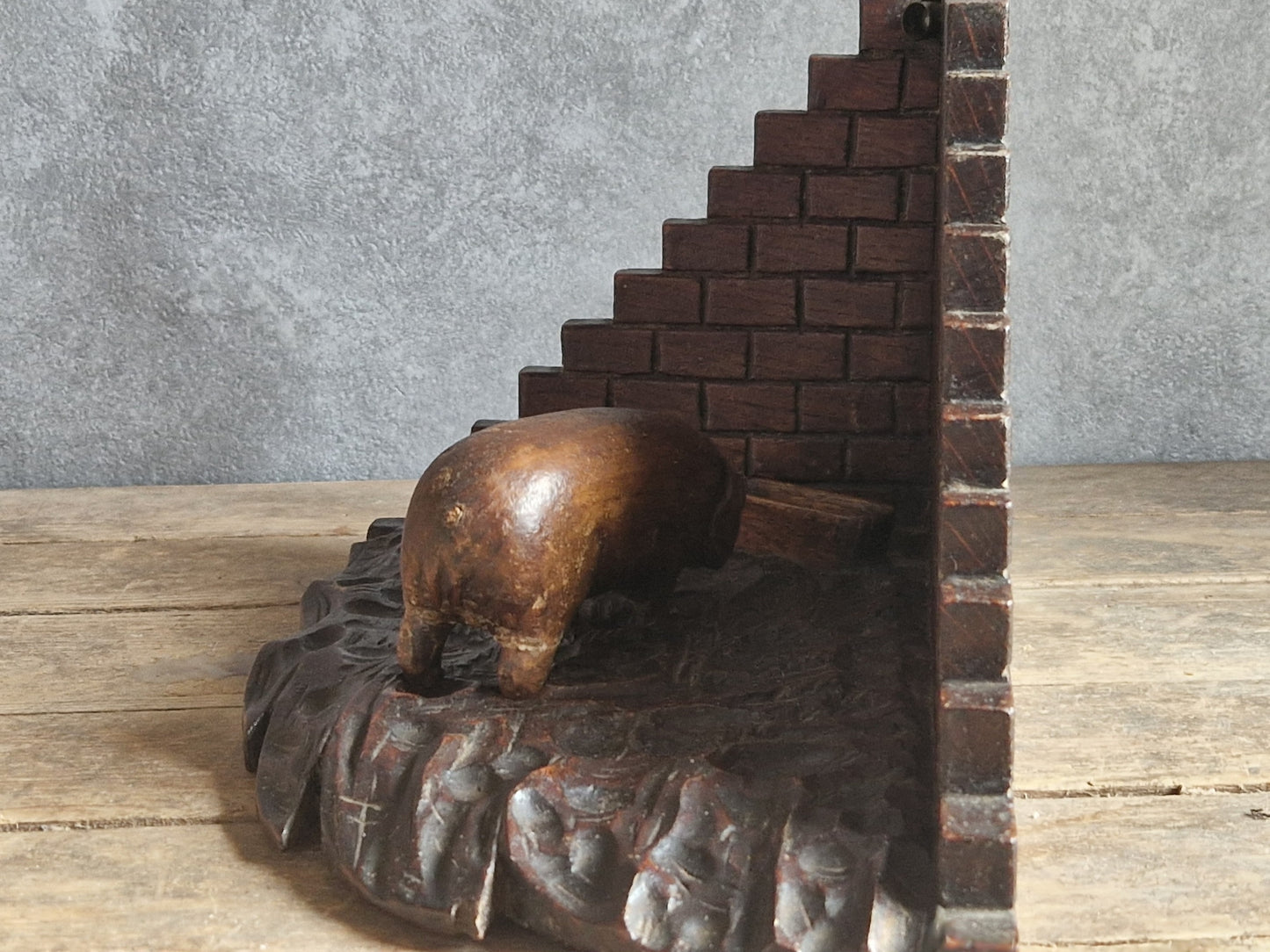 French wooden folk art pig diorama. Hand carved wooden pig in sty.
