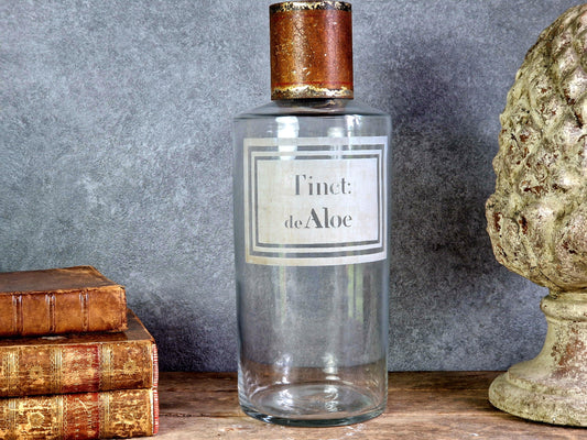 French antique apothecary bottle. Antique pharmacy bottle "Tinct de Aloe" with toleware lid.