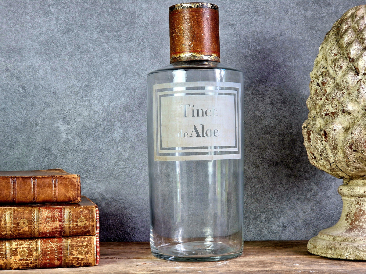 French antique apothecary bottle. Antique pharmacy bottle "Tinct de Aloe" with toleware lid.