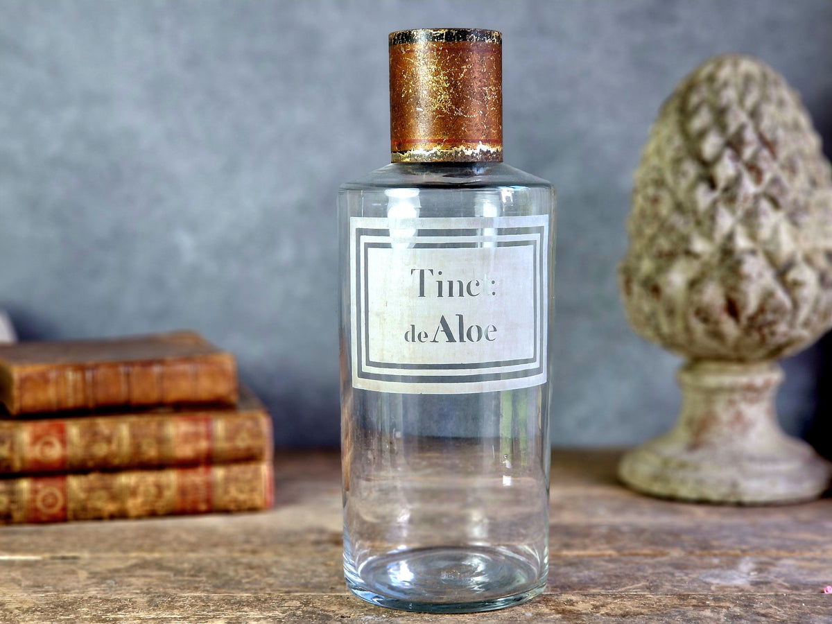 French antique apothecary bottle. Antique pharmacy bottle "Tinct de Aloe" with toleware lid.