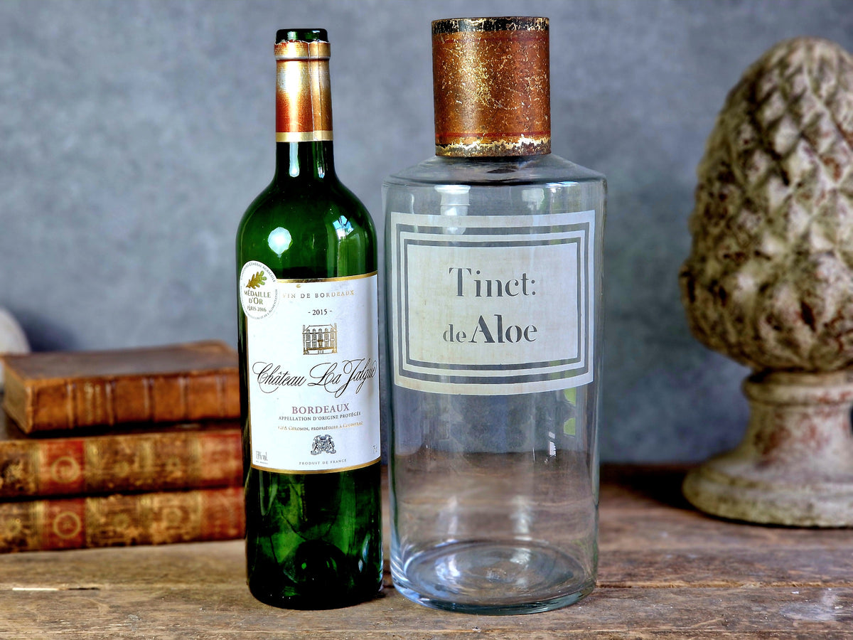 French antique apothecary bottle. Antique pharmacy bottle "Tinct de Aloe" with toleware lid.
