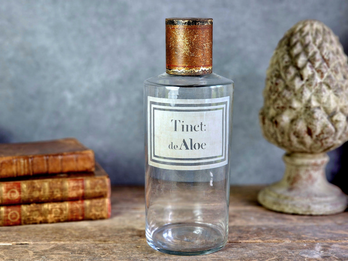 French antique apothecary bottle. Antique pharmacy bottle "Tinct de Aloe" with toleware lid.