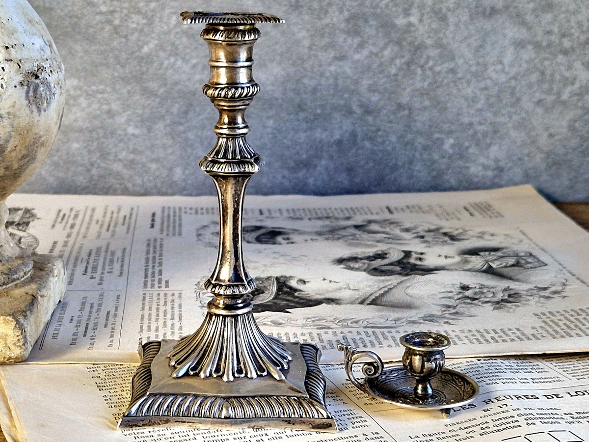 Antique silver taperstick by Thomas Bradbury and sons London 1902 and a small taper chamberstick.