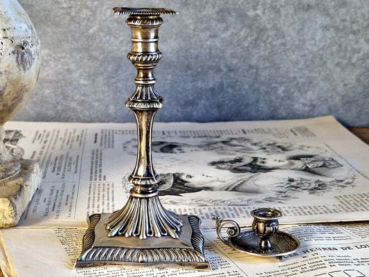 Antique silver taperstick by Thomas Bradbury and sons London 1902 and a small taper chamberstick.