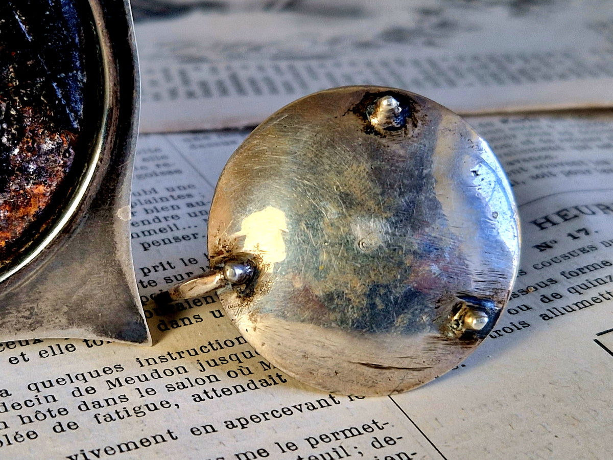 Antique silver taperstick by Thomas Bradbury and sons London 1902 and a small taper chamberstick.