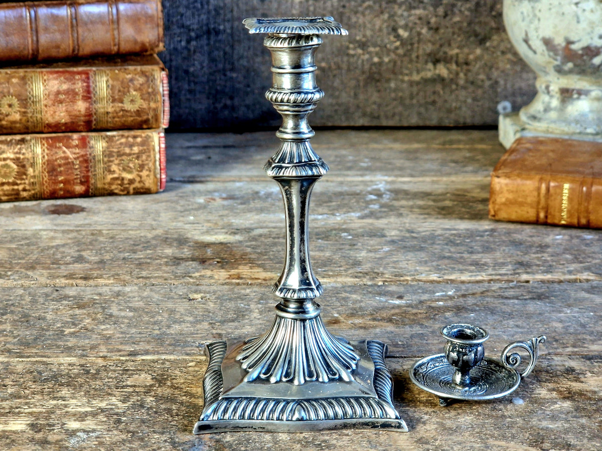 Antique silver taperstick by Thomas Bradbury and sons London 1902 and a small taper chamberstick.