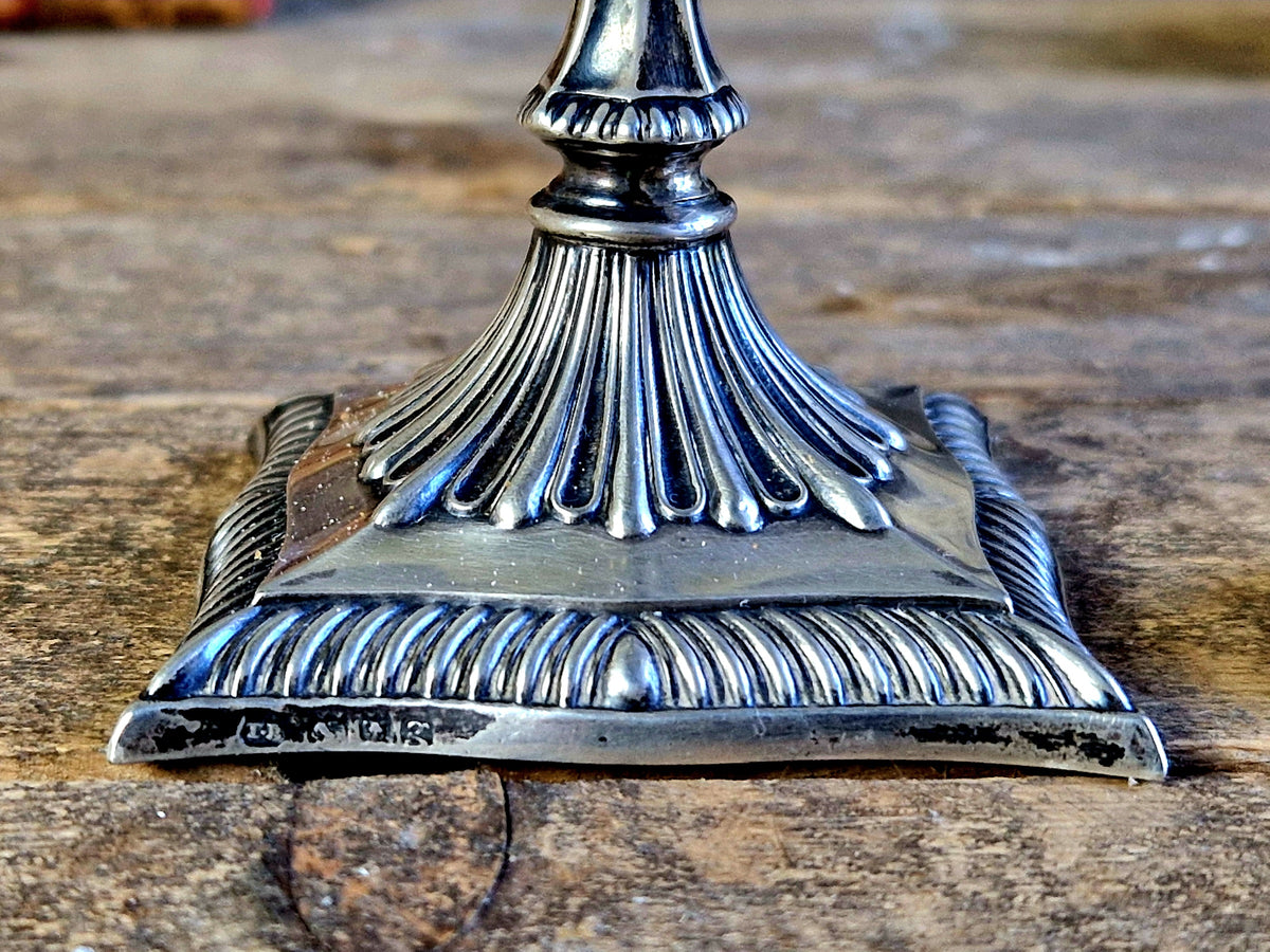 Antique silver taperstick by Thomas Bradbury and sons London 1902 and a small taper chamberstick.